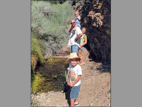 Happy hikers at the spring